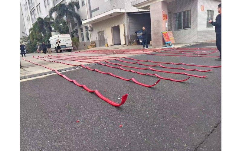 Red firecrackers ring in the new work start